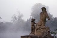 Statues in the morning mist