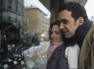 Couple in front of a shop window