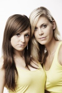 Two young woman, a blond and ...