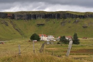 Deserted farm in front of a s...