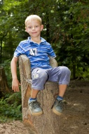 6-year-old boy sitting on a t...