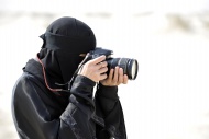 Photographer, Arab woman in t...