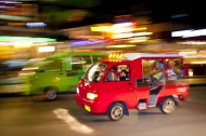 Tuk-tuks transporting passeng...