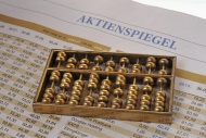 Chinese abacus lying on a Ger...