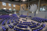 Empty plenary hall with a sma...