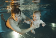 Father and baby, baby swimming