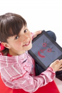 Boy, 9 years, with iPad