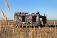 Abondoned shack with American...