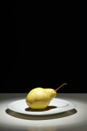 Pear (Pyrus communis) on a wh...