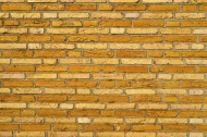 Yellow glazed brick wall, cli...