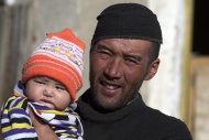 Kirghiz man with baby, Pamir,...