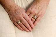 Wrinkly hands of an old woman...