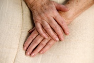 Wrinkly hands of an old woman...