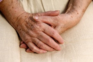 Wrinkly hands of an old woman...