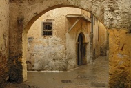 An arch and facades in the Ci...