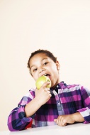 Girl biting an apple