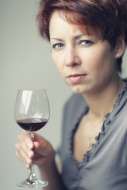 Young woman with a glass of r...