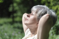 Elderly woman basking