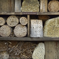 Insect hotel with the message...