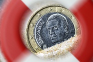 Spanish one-euro coin and a l...