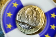Spanish one-euro coin sinking...