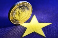 A Spanish-euro coin and an Eu...