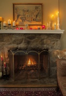 A cozy home with a fire burni...