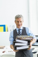 Germany, Businessman holding ...