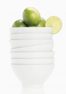 Stack of bowls with lime on w...