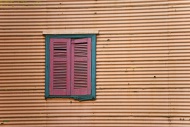 Closed shutters in a corrugat...