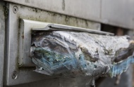 Mail rotting in a letterbox, ...