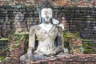Buddha statue at the ruins of...