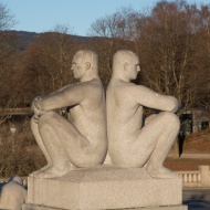 Granite sculpture, two men si...