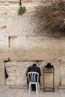 Ultra-orthodox Jew praying at...