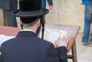 Ultra-orthodox Jew praying at...