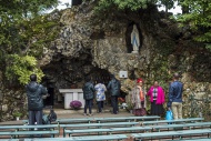 Pilgrims praying in front of ...