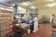 Women working at sausage prod...