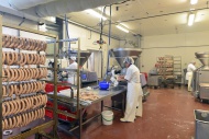Women working at sausage prod...
