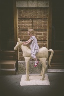 Little girl riding on a horse...