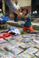Peru, Lima, boy selling pirat...