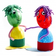 Two painted egg figurines