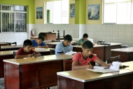 Peru, Brena, pupils doing hom...