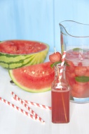Carafe with watermelon, straw...