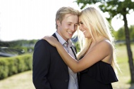 Smiling elegant young couple ...