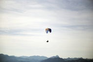 Austria, Tyrol, paraglider in...