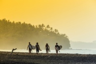 Indonesia, Bali, surfers on b...