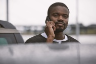 Young man outdoors on the phone