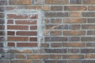 Repaired old brick wall