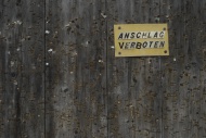Prohibition sign on wooden wall