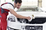 Car cleaning, man cleaning car